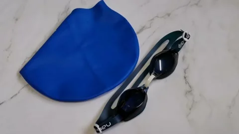 Swim Cap and Goggles Stock Footage 170028542