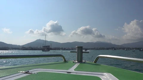 Swim to the island. View from the bow of the boat. Opens port, yachts, island... Video stock 106966530