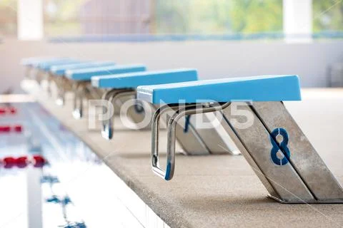 Swiming pool and jumping stand Stock Photos