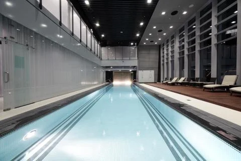 Swiming pool inside building Stock Photos