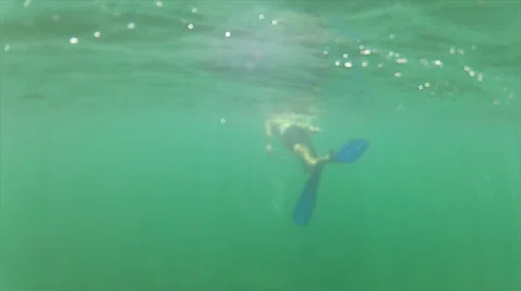 Swimmer bubbles chase Stock Footage 24348539