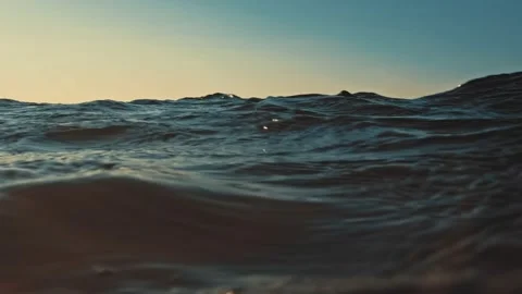 Swimmer Diving and Floating on Surface of Sea Water POV Stock Footage 210197971