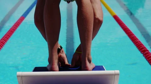 Swimmer Diving from a Block in Slow Motion Stock-Footage 56920697