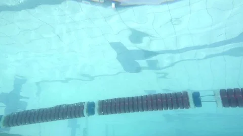 Swimmer diving Stock Footage