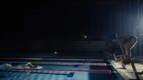 Swimmer diving into the pool Stock Footage 275618826