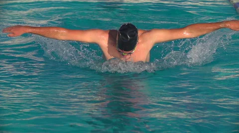 Swimmer doing the Butterfly stroke in Olympic swimming pool. 스톡 동영상 52730856