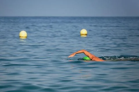 Swimmer floating crawl Stock Photos