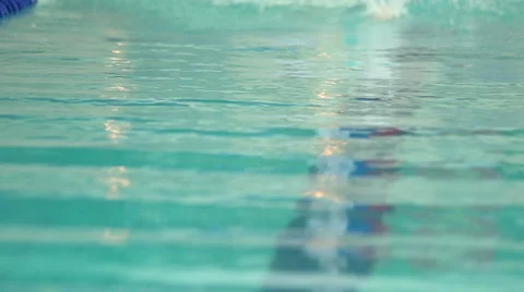 Swimmer floats in the pool Stock Footage 57363817