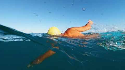 Swimmer Going Up And Down The Ocean Water During Training Stock Footage 316688744