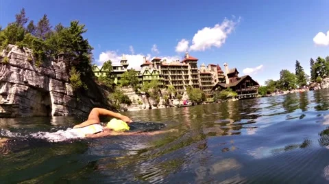 Swimmer in Mountain Lake Video stock 51843799