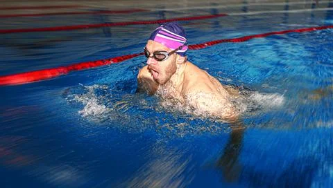 Swimmer in the pool. Stock Photos