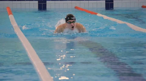 Swimmer in the pool rapidly shooting Stock Footage 59937044