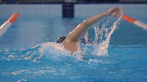 Swimmer in the pool rapidly shooting Stock Footage 59937110