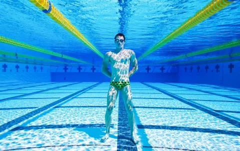 Swimmer in the pool underwater Stock Photos