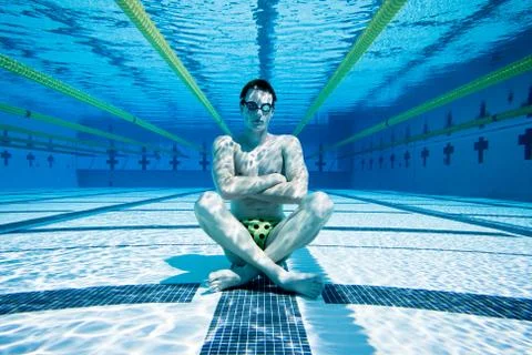 Swimmer in pool underwater Stock Photos