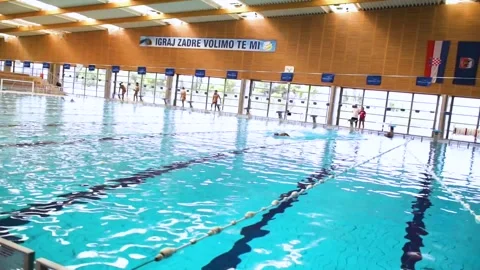 Swimmer Practicing Front Crawl Style In An Indoor Pool Stock Footage 250232826