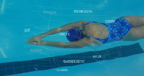 Swimmer pushing off wall gliding underwater while overlay floating and updating Stock Footage 320208562