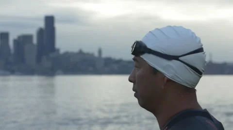 Swimmer removes goggles in Seattle. Stock Footage 40274261