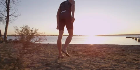 Swimmer Running Into Lake 스톡 동영상 105938380