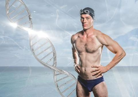 Swimmer with silver dna chain in front of the sea Stock Photos