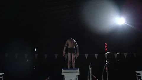 Swimmer stands in the pool by the water Video stock 132893571