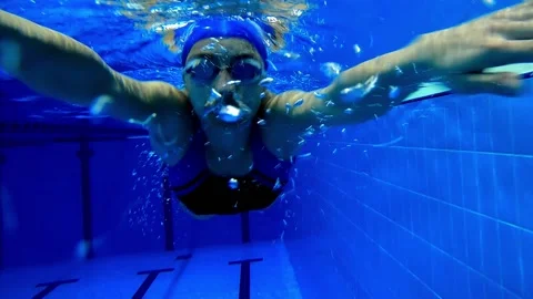 Swimmer swimming in big swimming large p... | Stock Video | Pond5