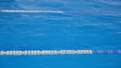 Swimmer swims to the finish Stock Footage 71847322