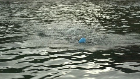 Swimmer tracking shot by drone Stock Footage 118833679