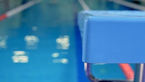 Swimmer trains in the pool. Camera on slider Stock Footage 99191197