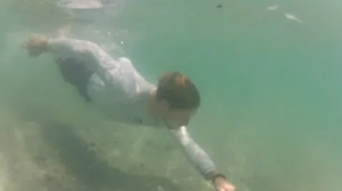 Swimmer underwater in ocean Stock Footage 27691684