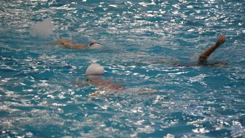 Swimmers are practicing in swimming pool. Stock Footage 194345013
