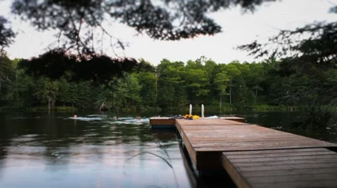 Swimmers off dock time lapse Stock Footage 7755749