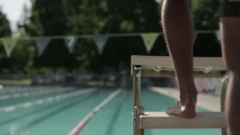 Swimmer's feet climbing Stock-Footage 77053559