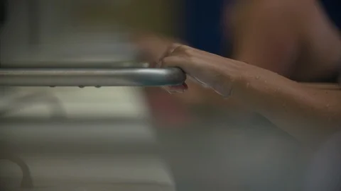 Swimmers' Hands Leaving Start Bar 스톡 동영상 105935259