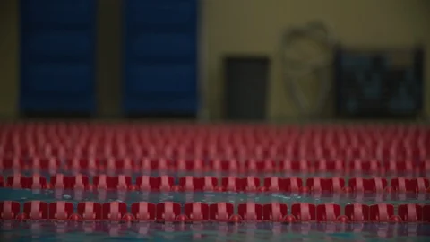 Swimmers Jumping Into Pool 스톡 동영상 105935292