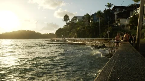 Swimmers leave the sea at Cabbage Tree Bay in Sydney 6K Video stock 307594008