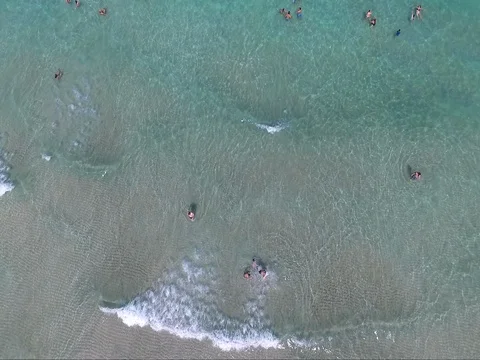 Swimmers in the ocean aerial 스톡 동영상 78542437