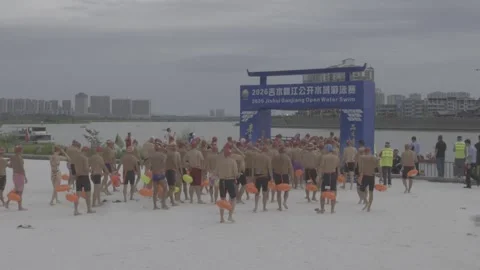 Swimmers Running Into Gan River At Start Of Open Water Competition Stock-Footage 343553642
