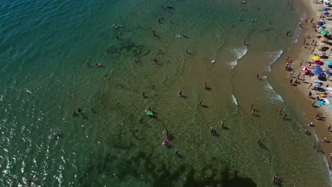 Swimmers in the sea Stockbeeldmateriaal 138441086