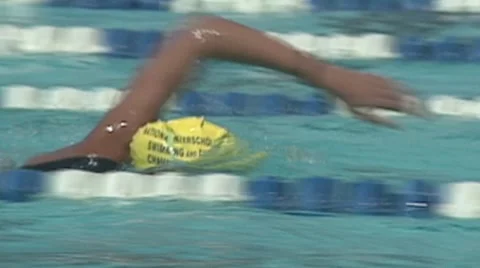 SWIMMERS WARM UP SHOT FROM SIDE CLOSE UP - sportfilm 10070a Video stock 51056203