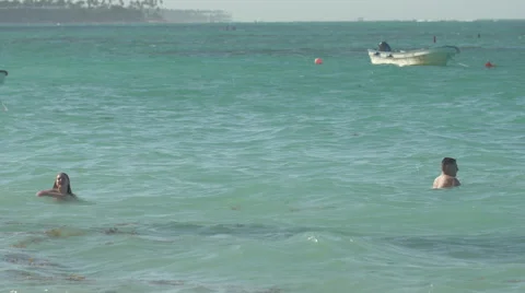 Swimming and having fun on the beach in The Dominican Republic Stock Footage 50392406