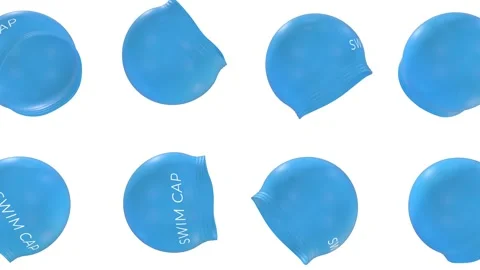 Swimming Caps Falling on a Light Blue Background. Silicone Swim Caps 3D. 4K Stock Footage 311793666