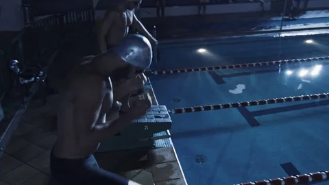 Swimming competition by night Stock Footage