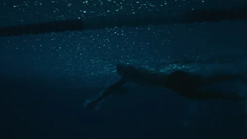Swimming freestyle from underwater Video stock 169210853