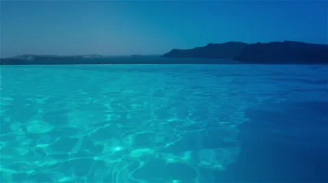 Swimming in infinity pool Stock Footage 40619179