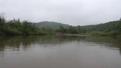 Swimming on an inflatable kayak Stock-Footage 107032031