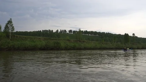 Swimming on an inflatable kayak Stock-Footage 107032032