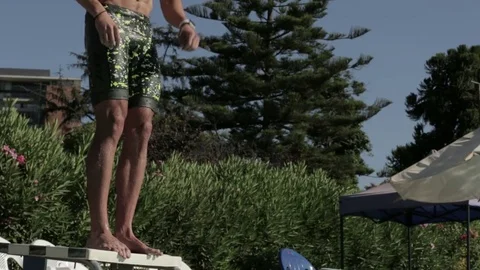 Swimming jumping into pool Stock Footage 77053569