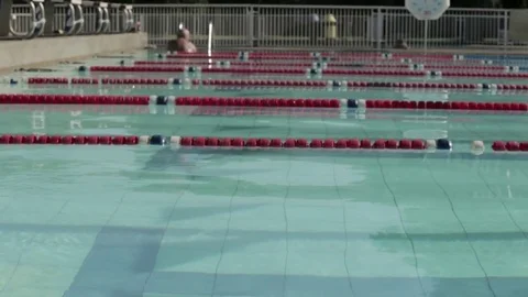 Swimming jumping into pool Stock Footage 77053570