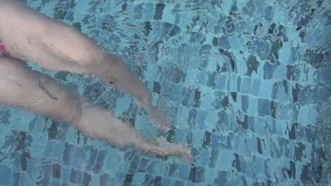 Swimming legs slow motion Stock Footage 89753822
